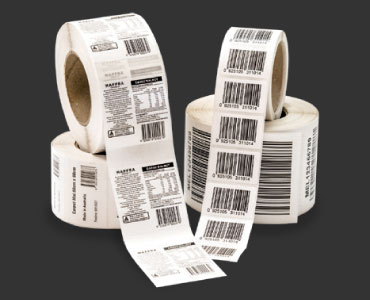 Rolls of labels printed with consecutive numbers or barcodes